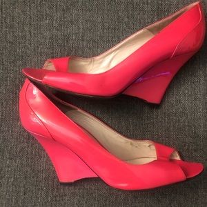 Hot pink patent leather wedges